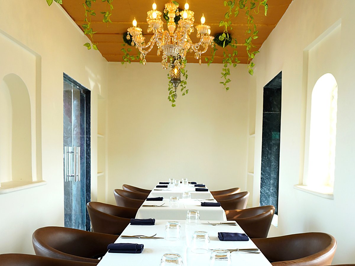 Elegant private dining table set at Alora Delhi