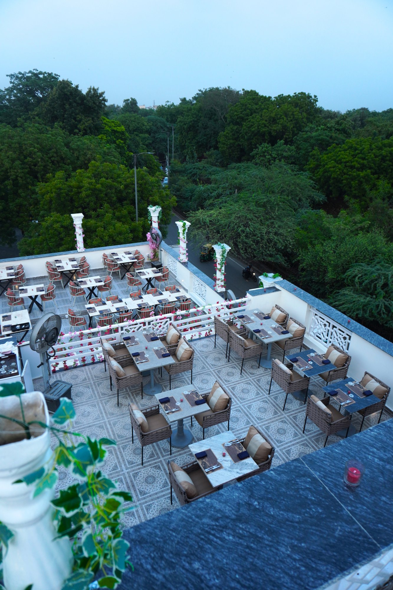 Alora Delhi rooftop overview at blue hour
