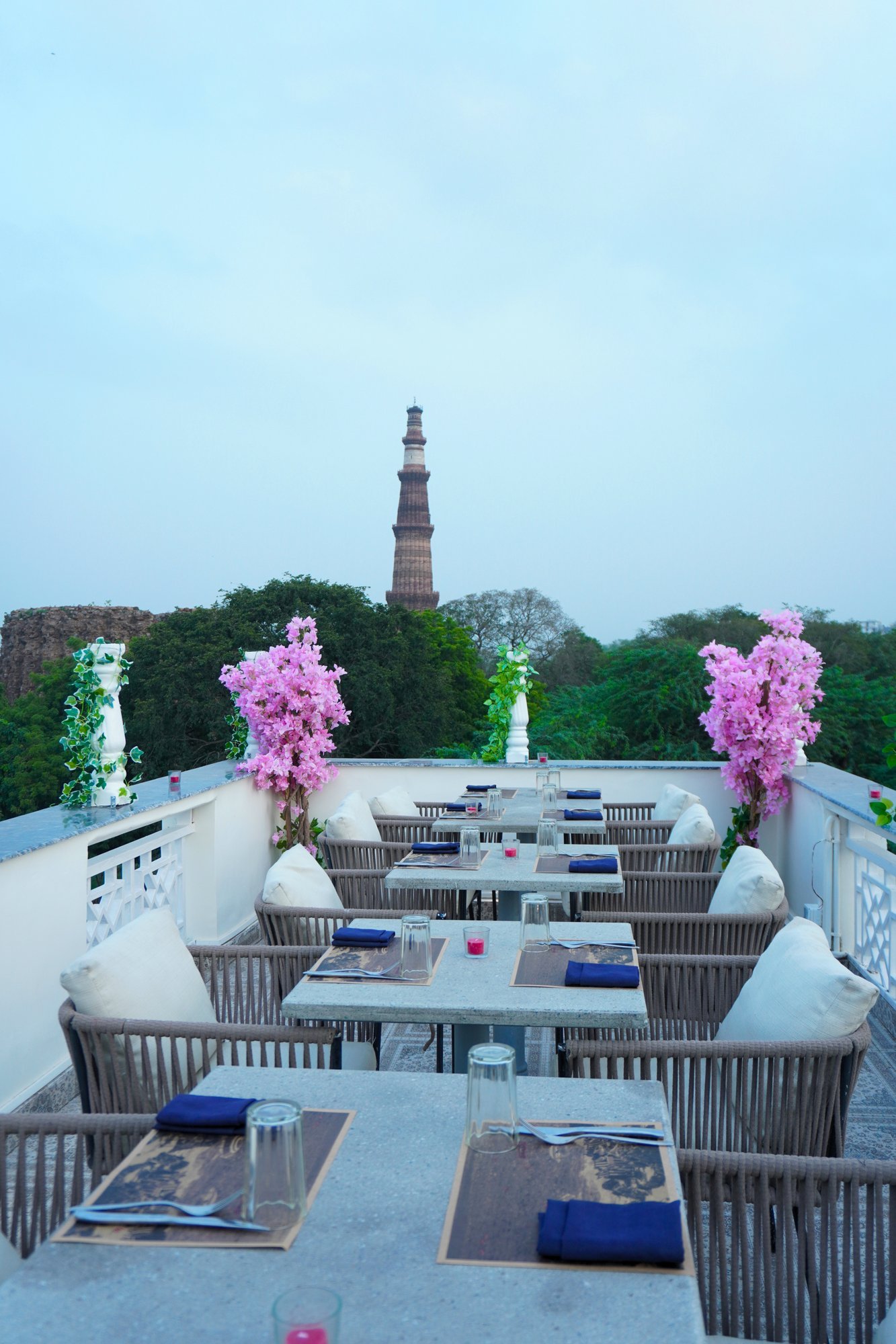 Alora Delhi rooftop terrace facing the Qutub Minar
